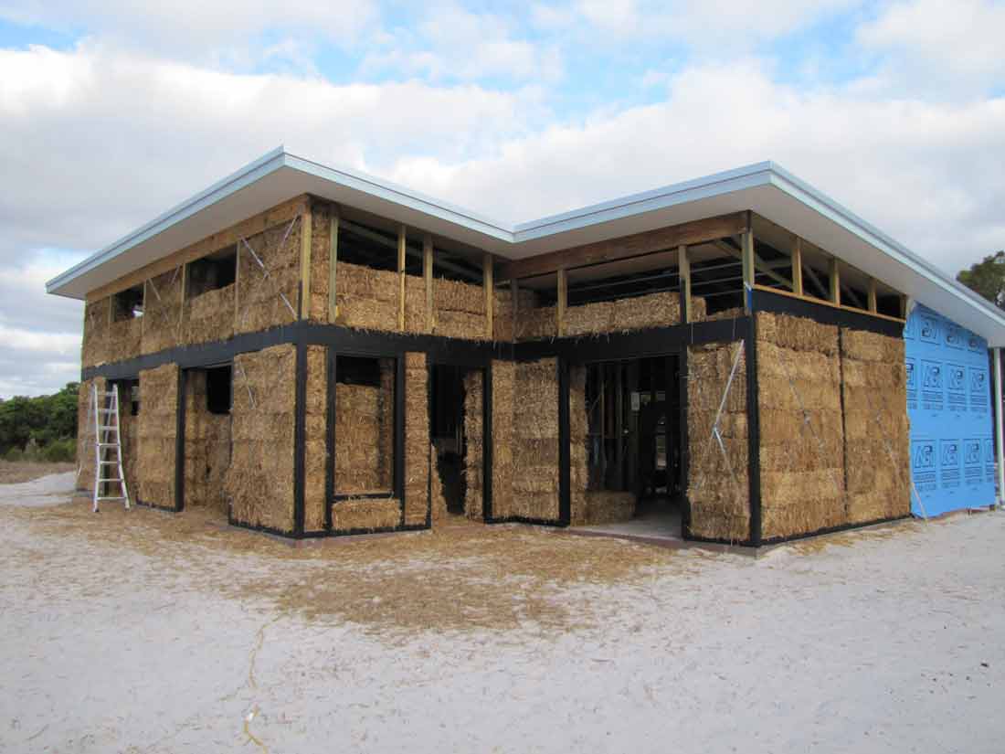 Straw Bale House Build: The Bricks of the Future? - The Organic & Natural  Paint Co